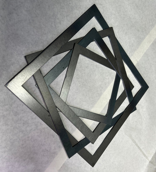 Four, 14 Gauge Steel squares overlay each other and welded together creating modern  wall art